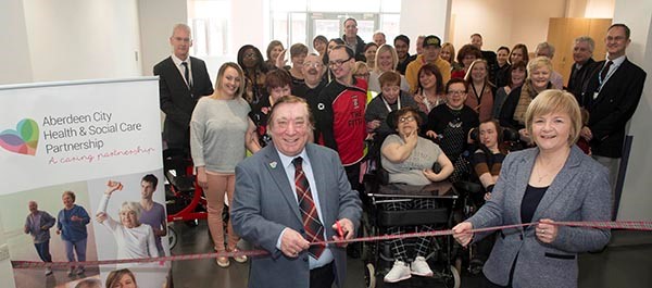 A ribbon being cut to launch the strategy